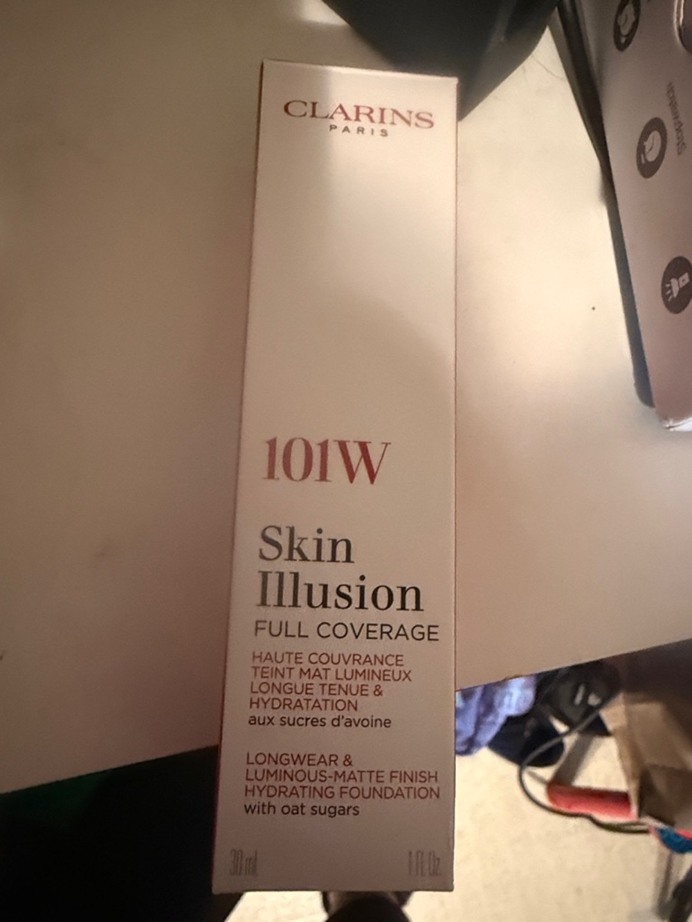 Clarins Skin Illusion Full Coverage Foundation 101W - White & Pink Text